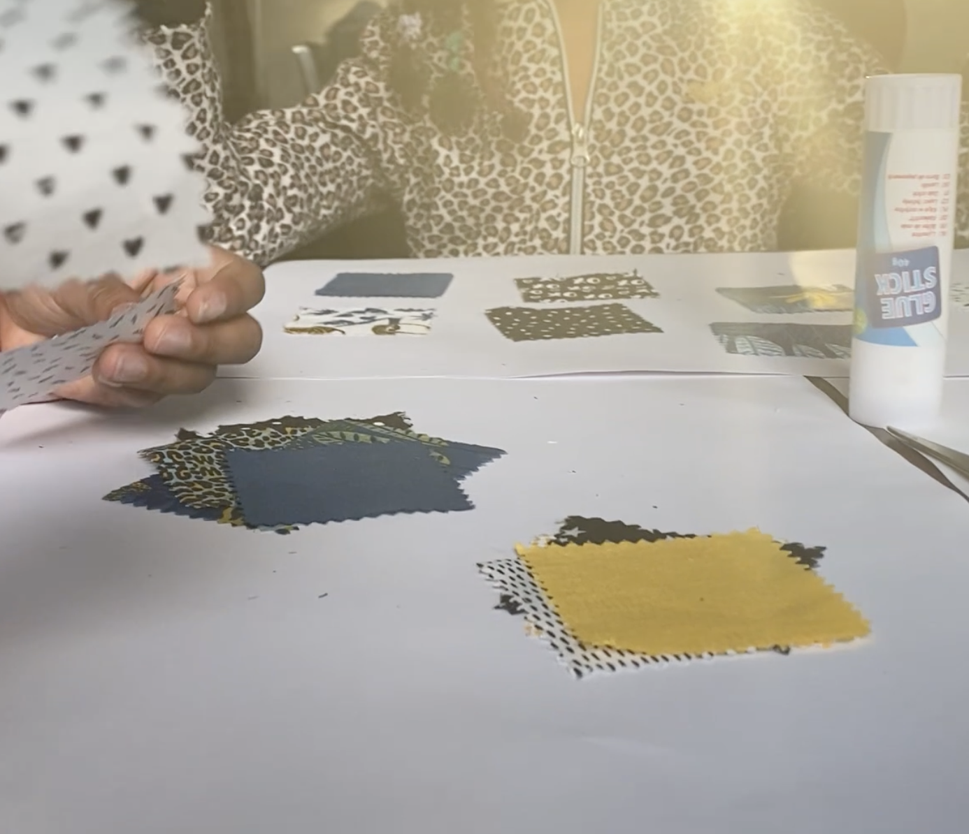 Fabric swatches and crafting workspace